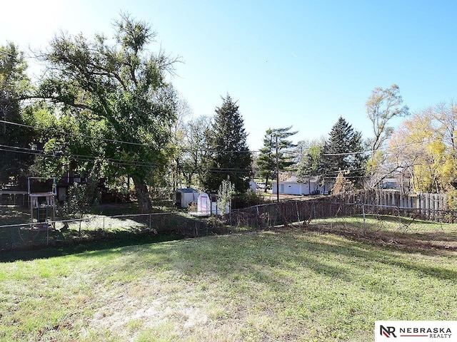 view of yard with fence