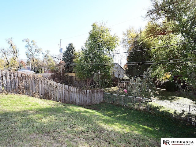 view of yard with fence