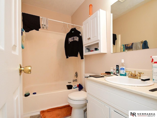 bathroom featuring vanity, toilet, and shower / tub combo with curtain