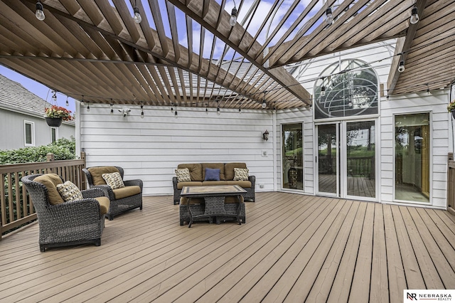 deck featuring an outdoor living space and a pergola