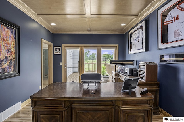 office featuring wood finished floors, visible vents, baseboards, and ornamental molding