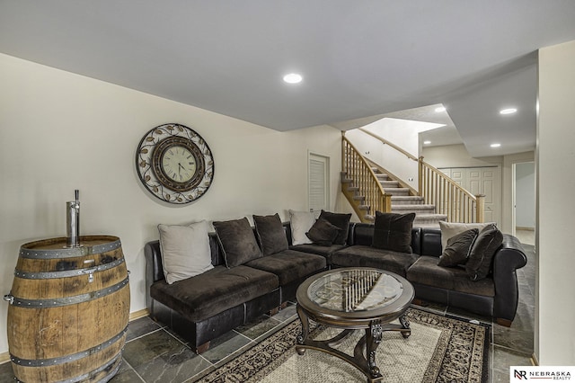 living area featuring recessed lighting and stairway