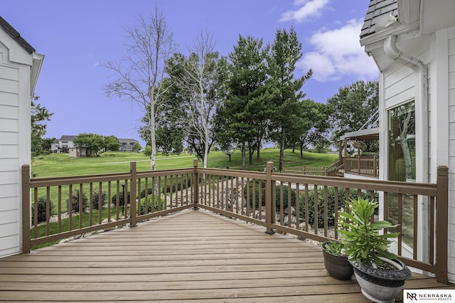 deck featuring a yard