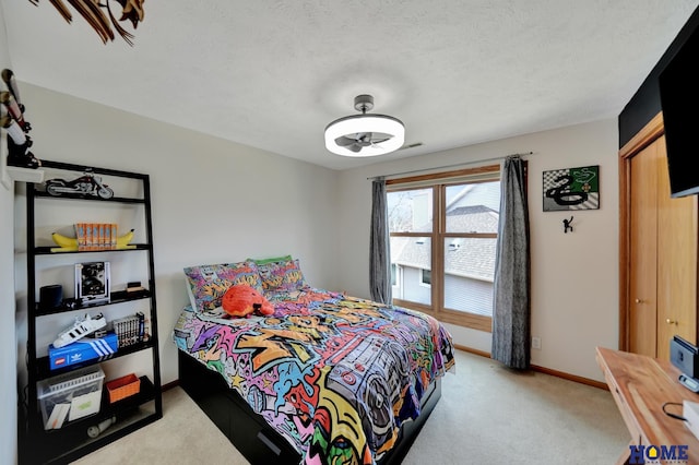 carpeted bedroom with visible vents and baseboards