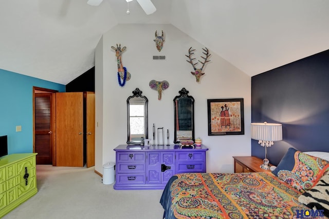 carpeted bedroom featuring visible vents, high vaulted ceiling, and a ceiling fan