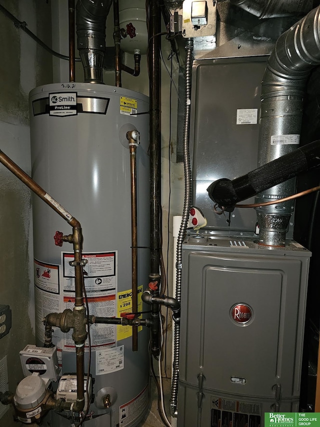 utility room featuring heating unit and gas water heater