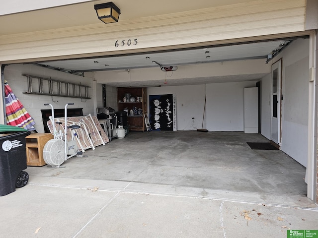 garage featuring a garage door opener