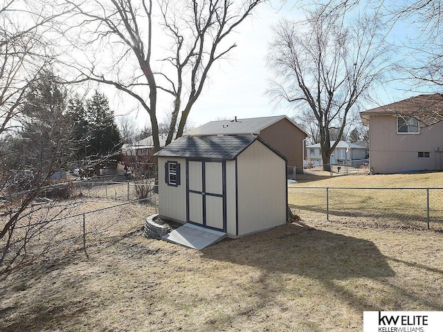 view of shed featuring a fenced backyard