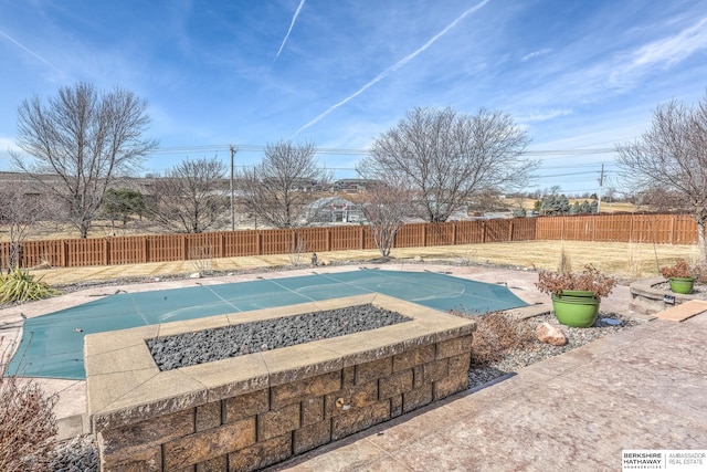 view of pool featuring a fenced backyard