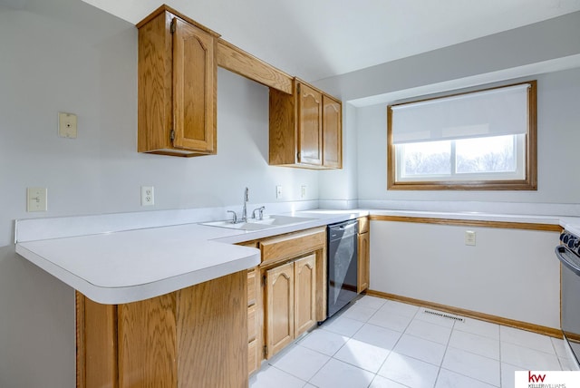 kitchen with dishwashing machine, a peninsula, a sink, light countertops, and brown cabinets