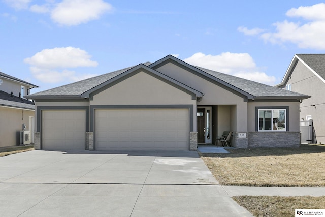 view of front of house with stone siding, stucco siding, and an attached garage