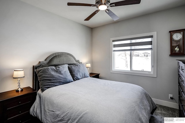 bedroom featuring baseboards, carpet, and a ceiling fan