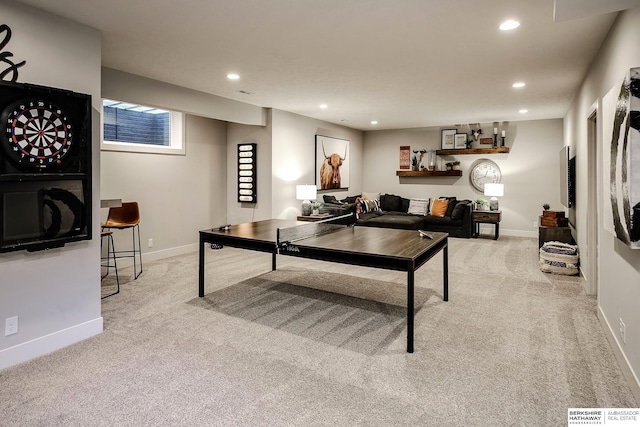 interior space featuring visible vents, recessed lighting, baseboards, and light carpet