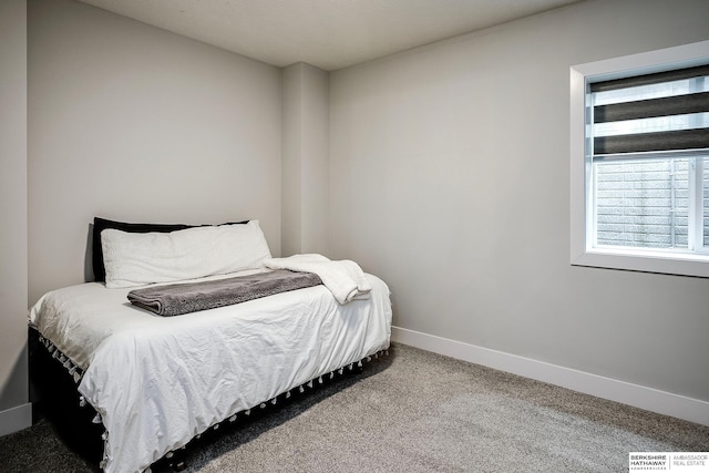 bedroom featuring visible vents, baseboards, and carpet floors