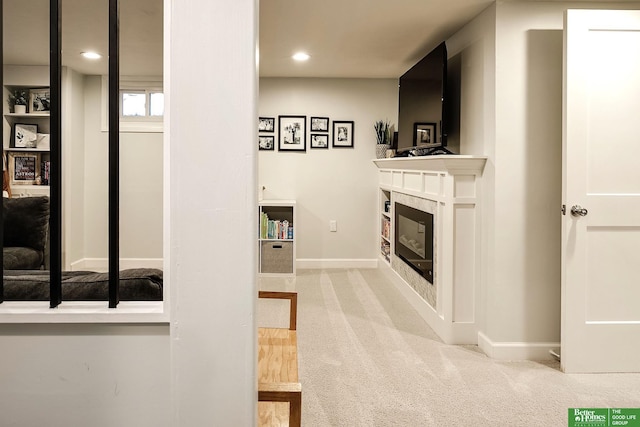 hallway with recessed lighting, baseboards, and carpet floors