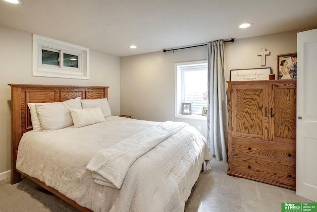 carpeted bedroom with recessed lighting