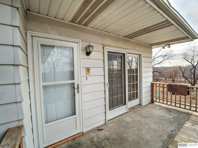 entrance to property with covered porch