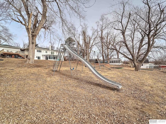 view of yard featuring playground community