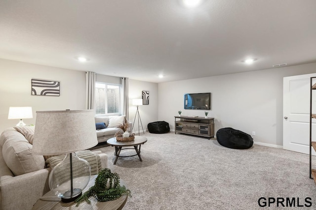 carpeted living room with recessed lighting, visible vents, and baseboards