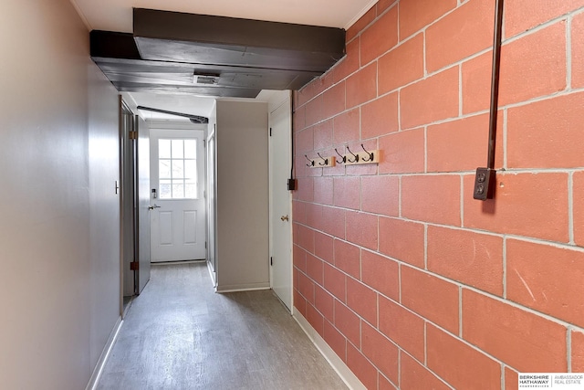 hallway with concrete block wall