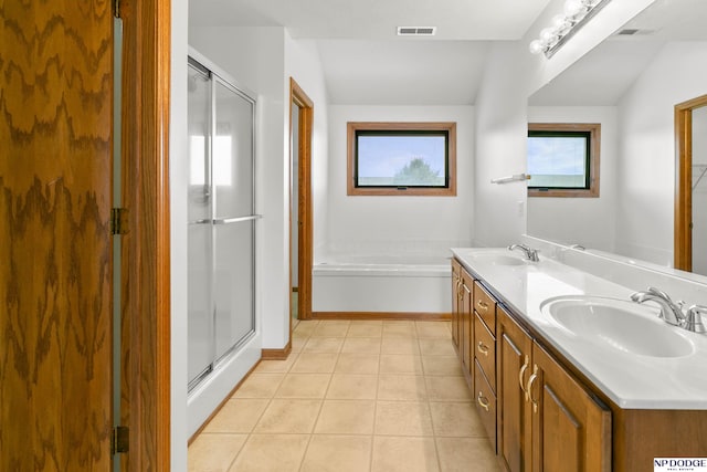 full bath featuring tile patterned flooring, a shower stall, visible vents, and a sink