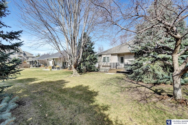 view of yard with a deck