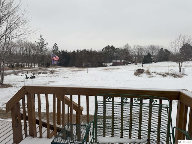 view of snow covered deck