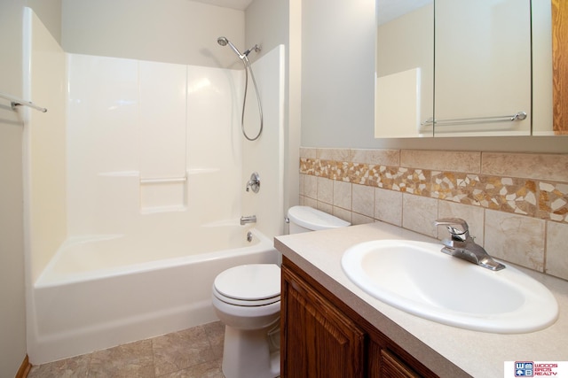 full bath with vanity, shower / bath combination, tile walls, toilet, and tile patterned floors