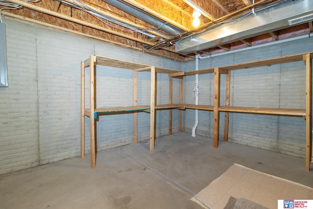 unfinished basement with brick wall