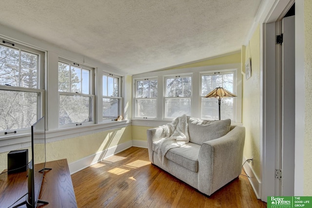 sunroom / solarium with lofted ceiling