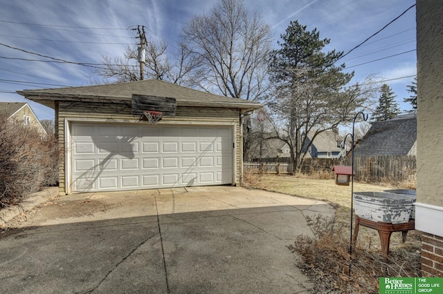 detached garage with fence