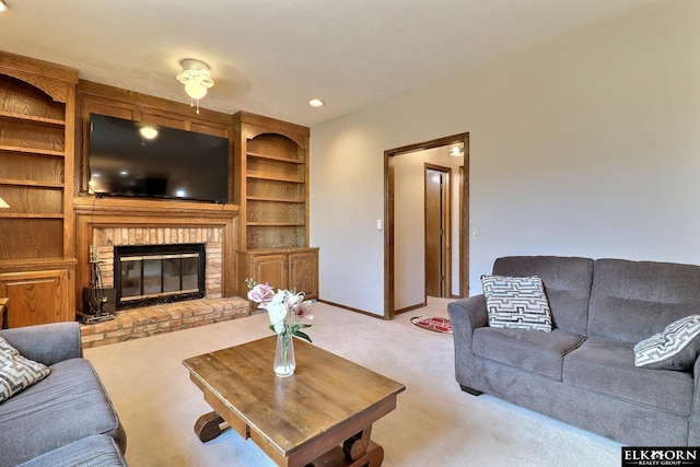 living area with a brick fireplace, recessed lighting, baseboards, and light carpet