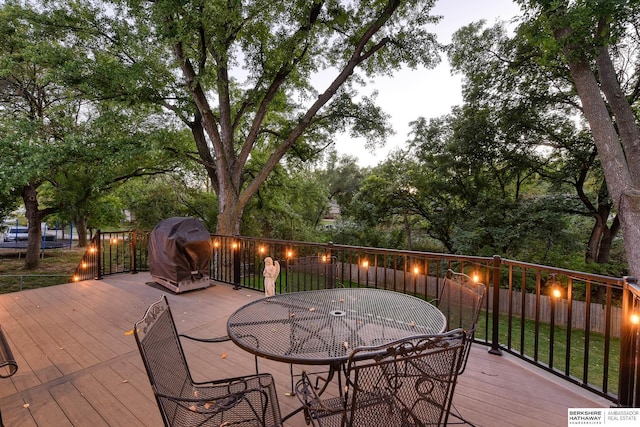 deck with outdoor dining space