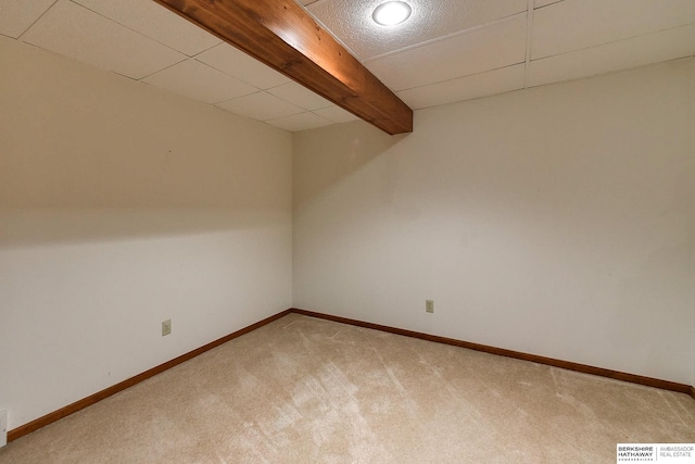 interior space featuring light colored carpet, visible vents, and baseboards