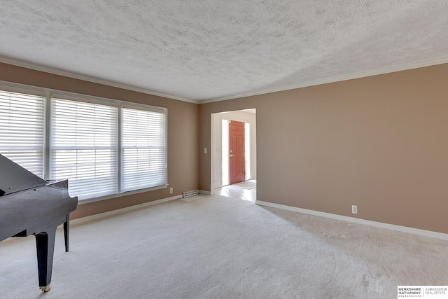 unfurnished room featuring light carpet, a textured ceiling, crown molding, and baseboards