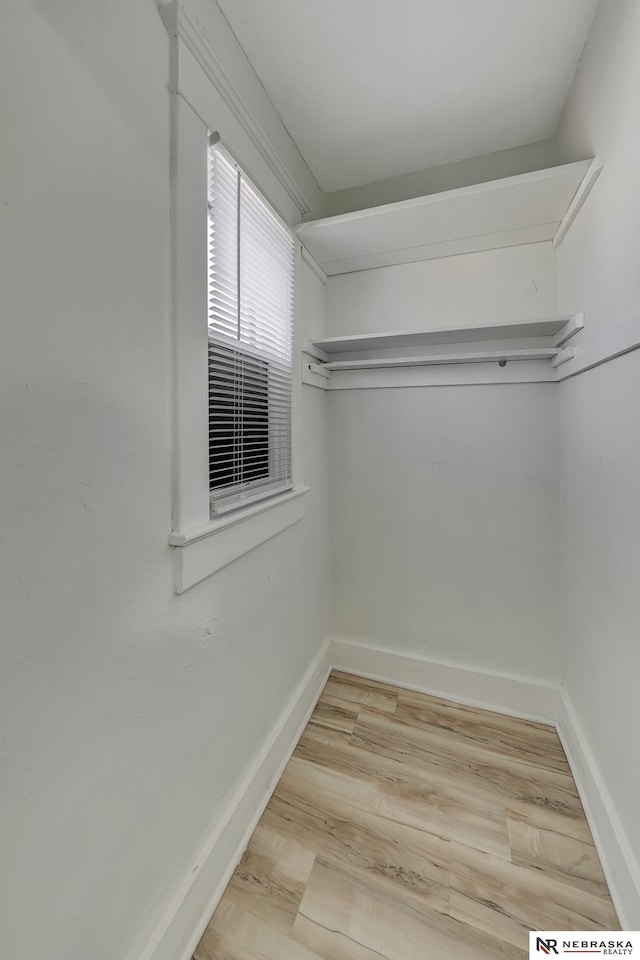 spacious closet with light wood-type flooring