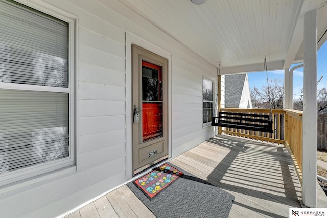 wooden terrace with covered porch