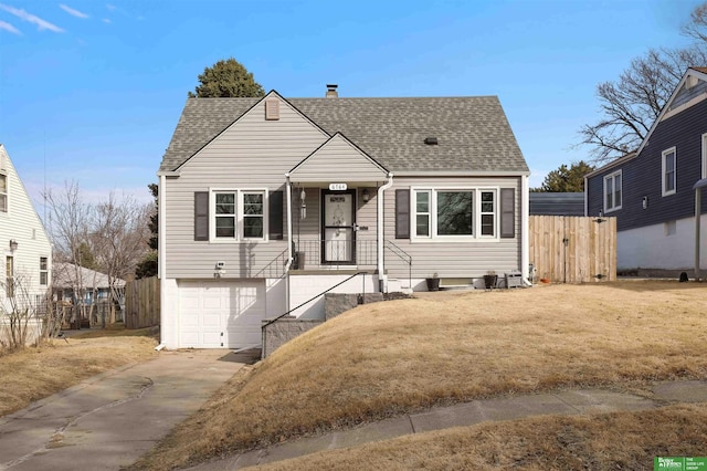 bungalow-style home featuring fence, a chimney, a shingled roof, a front lawn, and a garage