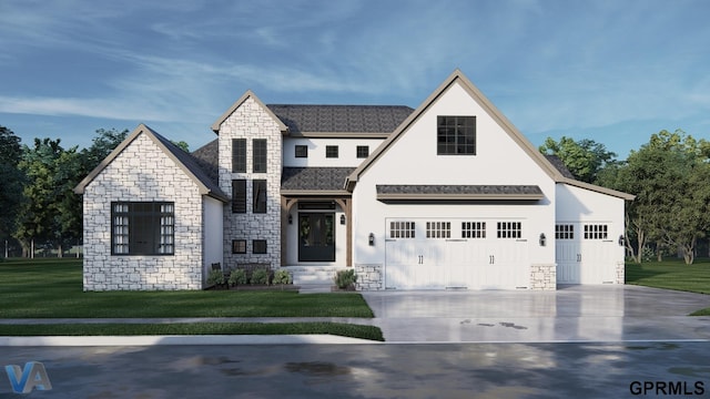 view of front of property with concrete driveway and a front lawn