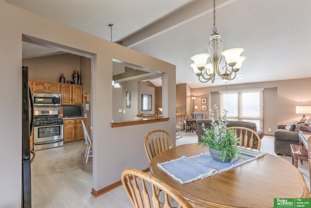 dining area featuring baseboards, a notable chandelier, and vaulted ceiling with beams