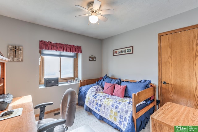 bedroom with visible vents, ceiling fan, and baseboards