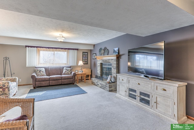 living room with a brick fireplace, carpet flooring, baseboards, and a textured ceiling