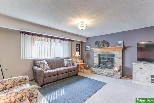 carpeted living room featuring a fireplace, a textured ceiling, and baseboards