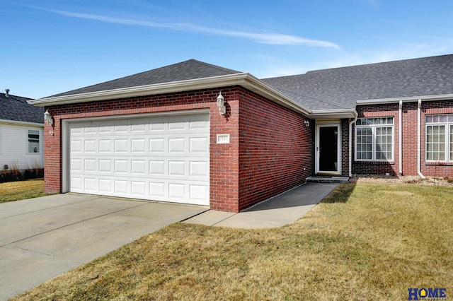 ranch-style home with brick siding, concrete driveway, roof with shingles, a front yard, and an attached garage