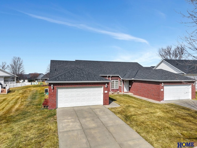 ranch-style house featuring brick siding, a front yard, concrete driveway, and an attached garage