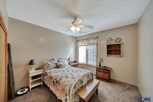 bedroom featuring ceiling fan, carpet flooring, baseboards, and a textured ceiling