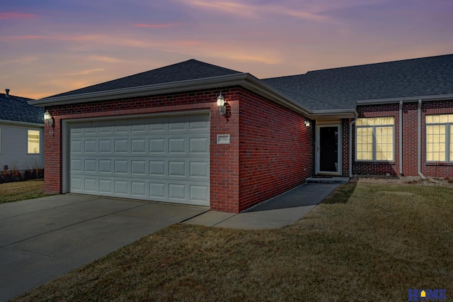 ranch-style house with brick siding, driveway, a shingled roof, and a garage