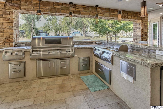 view of patio with grilling area and area for grilling