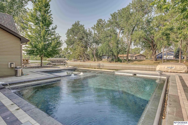 pool with a patio