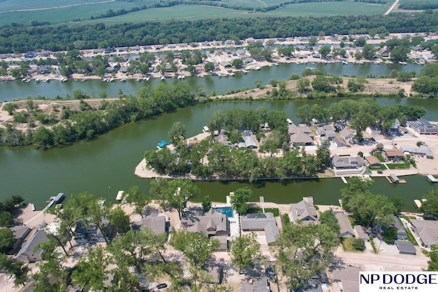 bird's eye view with a residential view and a water view